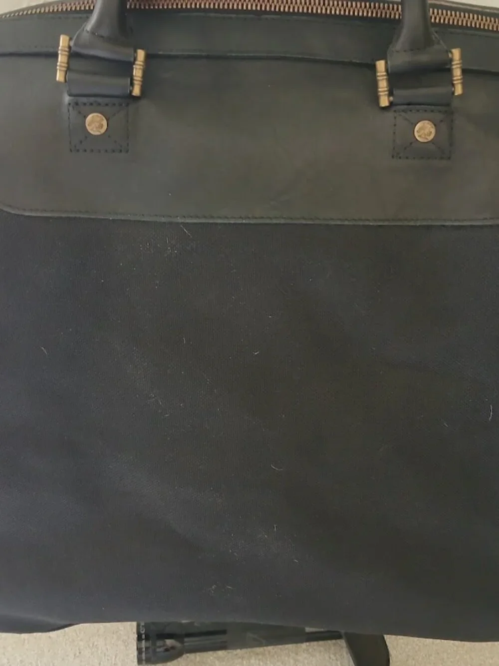 TOMMY BAHAMA Black Leather Canvas Travel Bag